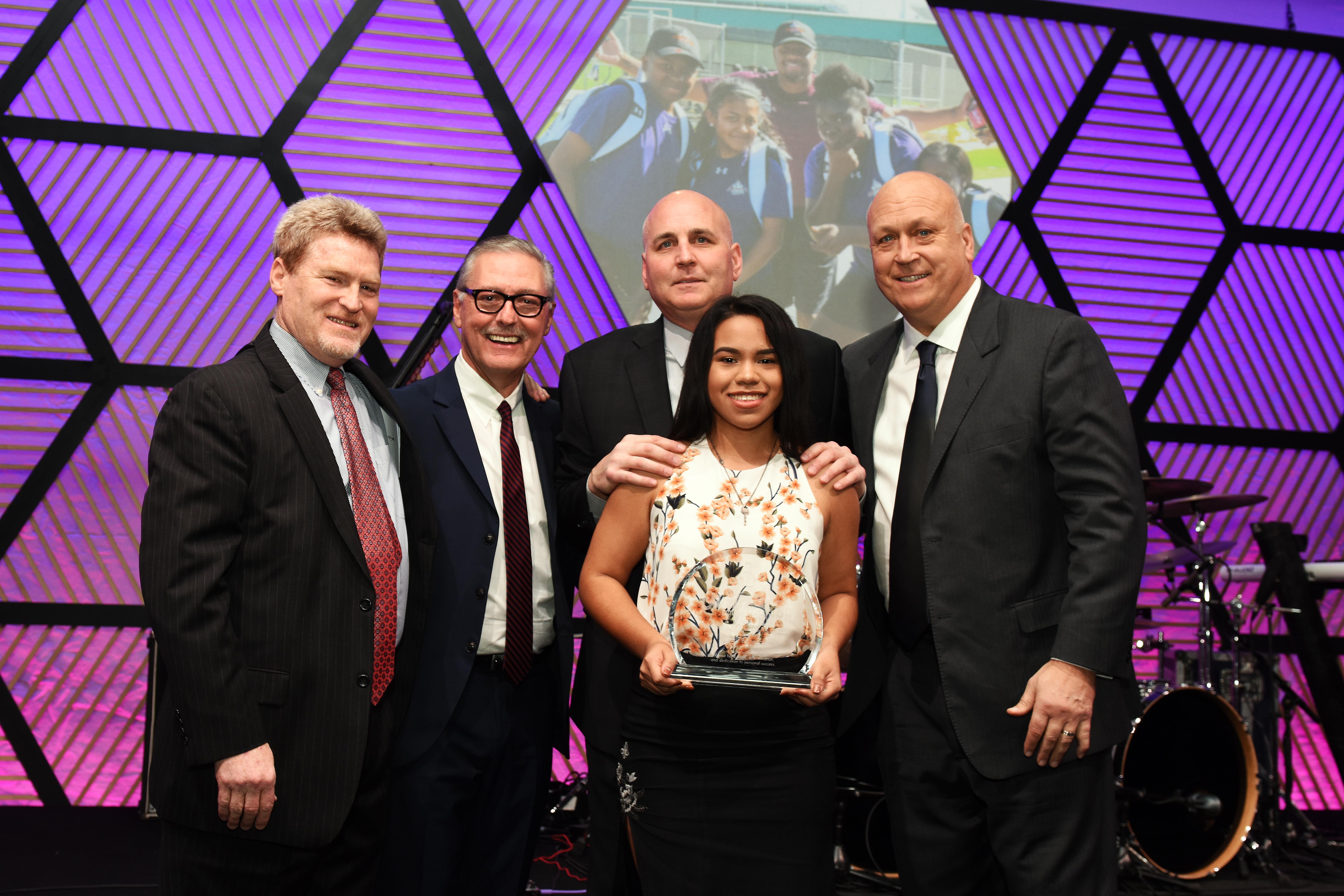 Scholarship winner Bessy Banegas with Steve Salem, Mark Butler, Cal Ripken, Jr., and Bill Ripken