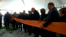 Cal Ripken Jr. cutting the ribbon at a ceremony